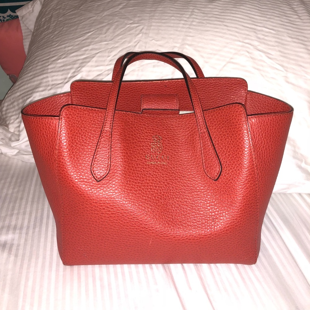 Red Gucci purse